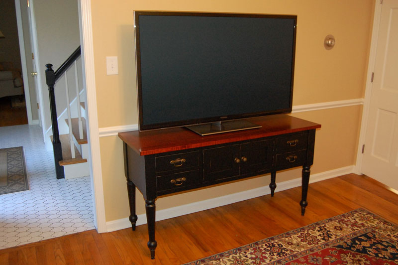 TV Stand with Tiger Maple Top stained with Michael's Cherry and a Brown Maple Base stained with a Black Rub-Through Stain